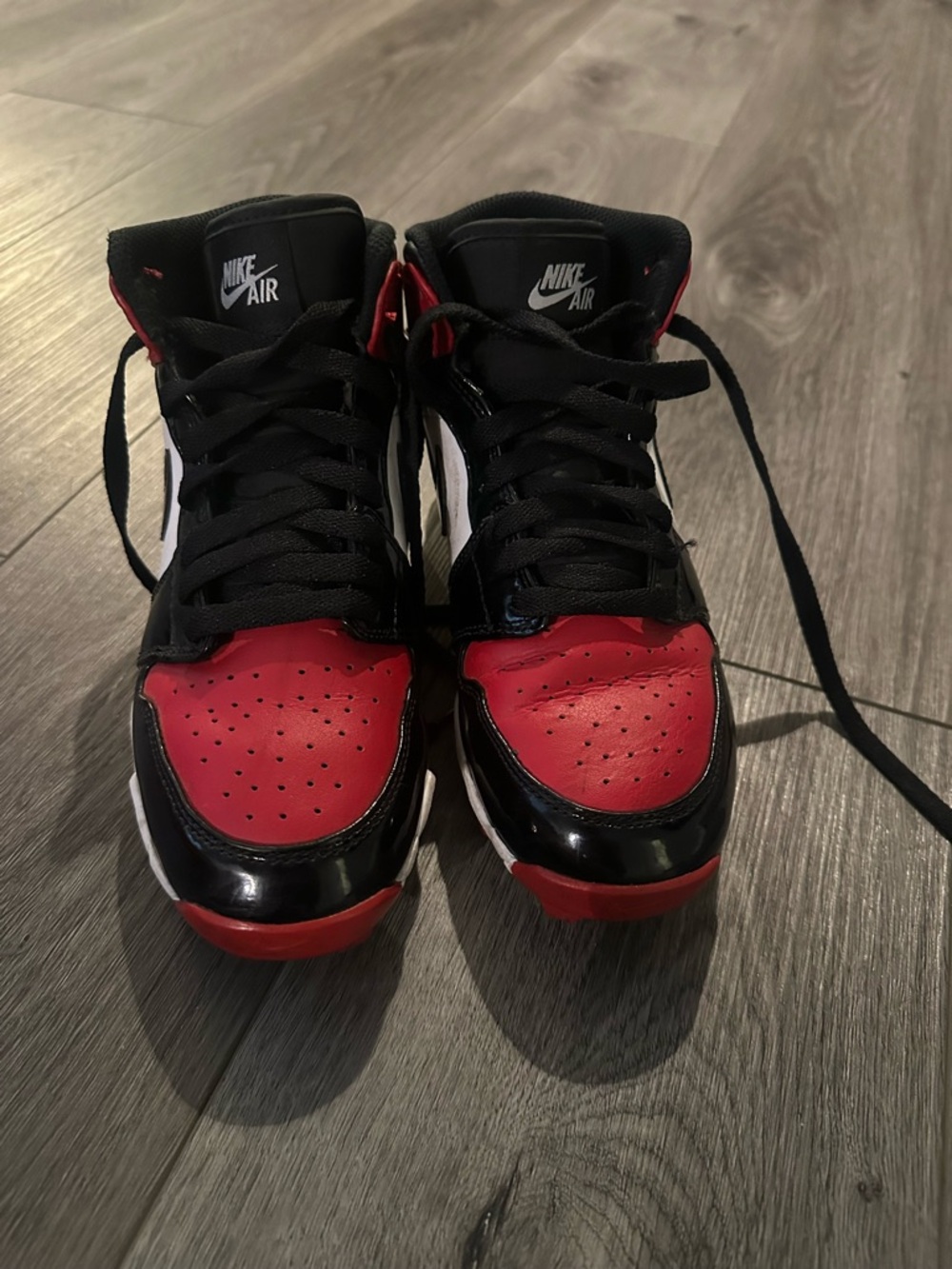 Nike Black, Red & White Jordan mid Top cleats